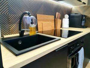 Kuchyňa alebo kuchynka v ubytovaní Apartament nad Iławką