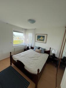 A bed or beds in a room at Summer Vibe Siofok