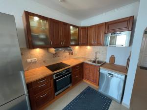 A kitchen or kitchenette at Summer Vibe Siofok