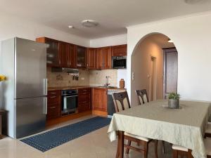 A kitchen or kitchenette at Summer Vibe Siofok