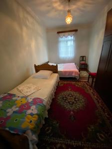 Postel nebo postele na pokoji v ubytování Guest House Gio