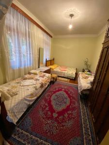 Postel nebo postele na pokoji v ubytování Guest House Gio