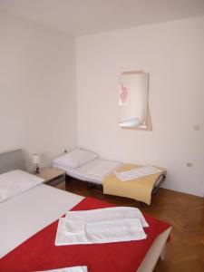 Postel nebo postele na pokoji v ubytování Apartman Teklić