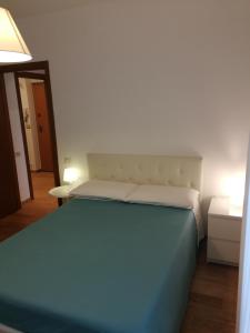 Postel nebo postele na pokoji v ubytování Comfort, pulizia, eleganza e affidabilità a Matera