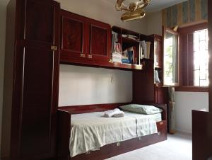 a bedroom with a bed in a room at Domus Garden in Olbia