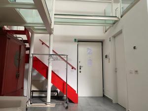 a hallway with a basketball hoop in a building at Living in Milan