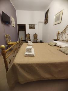 Postel nebo postele na pokoji v ubytování La Petite Maison