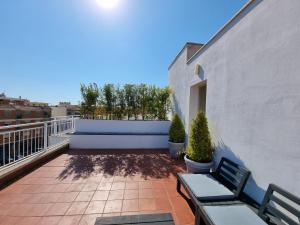 A balcony or terrace at REale Apartments