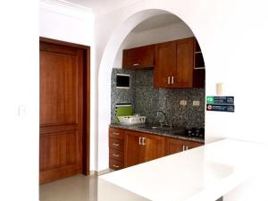 Kuchyň nebo kuchyňský kout v ubytování Blue Garden Apartment Punta Cana