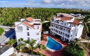 Výhled na bazén z ubytování Blue Garden Apartment Punta Cana nebo okolí