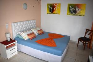 Postel nebo postele na pokoji v ubytování Hotel Pousada Rancho Fundo