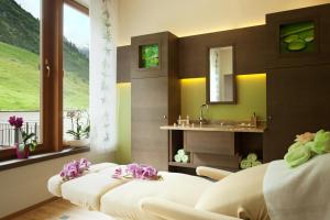 Un lugar para sentarse en Hotel Alpenhof