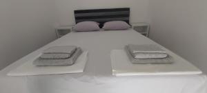 Ένα ή περισσότερα κρεβάτια σε δωμάτιο στο Urban House M & M +17 φωτογραφίες