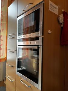 Kuchyň nebo kuchyňský kout v ubytování Palma Apartment