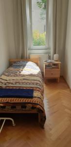 Cama ou camas em um quarto em Your cosy home at the heart of Vienna