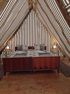 a bedroom with a bed in a tent at AMOJ B&B and Guest house in Alaverdi