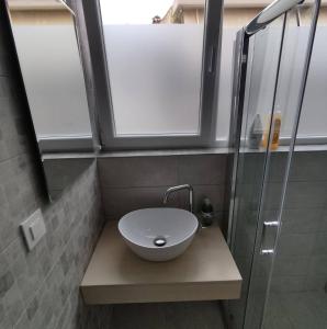 Kúpeľňa v ubytovaní PETMEZA APARTMENT 2 Aigio City F