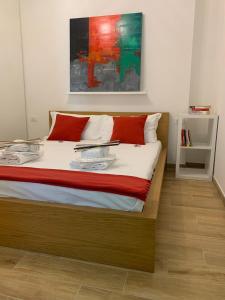 A bed or beds in a room at Bologna Suite Centre City