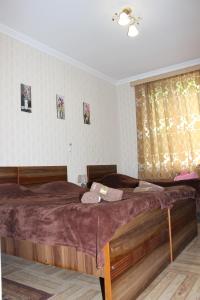 Postel nebo postele na pokoji v ubytování Guest house Maspindzeli