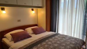 Cama o camas de una habitación en Villa Amalia Apartment 2