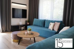 Televízia a/alebo spoločenská miestnosť v ubytovaní Apartament 15 Double Rest Jastrzębia Góra