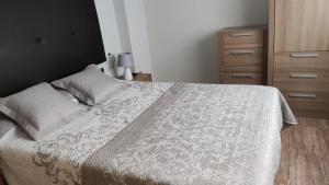 Postel nebo postele na pokoji v ubytování La Loma de Torrevieja