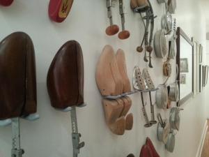 a bunch of utensils hanging on a wall at Ray's Bucktown Bed and Breakfast in Chicago