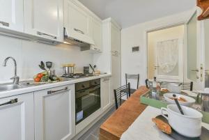 Kuchyňa alebo kuchynka v ubytovaní San Giuseppe Flat