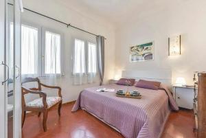 Posteľ alebo postele v izbe v ubytovaní San Giuseppe Flat