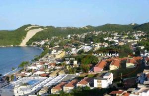 a view of a town next to a body of water at Natal Prime Yacht Village in Natal
