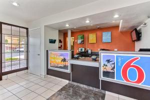 a fast food restaurant with a sign on the wall at Motel 6-Salinas, CA - North Monterey Area in Salinas