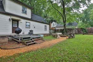 a backyard with a picnic table and a house at Atlanta Retreat Message For Spring Special in Atlanta