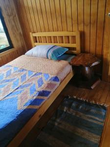 Postel nebo postele na pokoji v ubytování Cabaña piedra azul