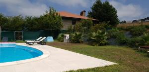 A piscina localizada em Quinta de Carvalhal - Casa de Campo ou nos arredores