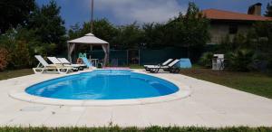 A piscina localizada em Quinta de Carvalhal - Casa de Campo ou nos arredores
