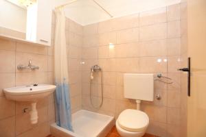 Kúpeľňa v ubytovaní Apartment Supetar 16656b