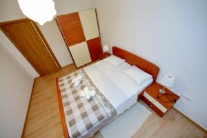 Posteľ alebo postele v izbe v ubytovaní Apartments with parking spaces Sukosan, Zadar - 16641