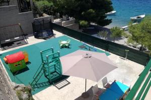 Fotografie z fotogalerie ubytování Family friendly seaside apartments Stanici, Omis - 16606 v Omiši + 37 fotografií