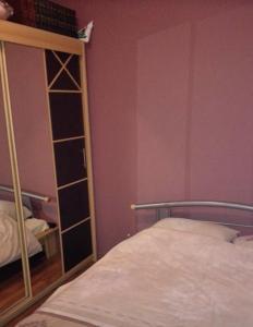 A bed or beds in a room at Apartments by the sea Crikvenica - 16970