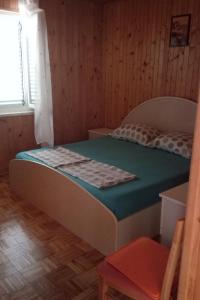 Postel nebo postele na pokoji v ubytování Seaside holiday house Razanac, Zadar - 16876
