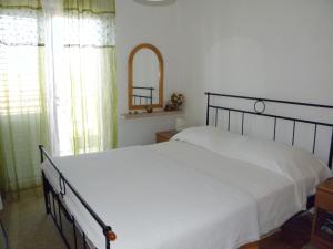 Ένα ή περισσότερα κρεβάτια σε δωμάτιο στο Holiday house with a parking space Supetar, Brac - 16615