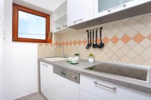 Fotografie z fotogalerie ubytování Family friendly apartments with a swimming pool Okrug Gornji, Ciovo - 16608 v Trogiru