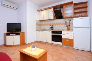 Fotografie z fotogalerie ubytování Family friendly apartments with a swimming pool Okrug Gornji, Ciovo - 16608 v Trogiru