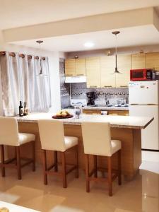 Kuchyň nebo kuchyňský kout v ubytování Luxury & Comfortable Apartment at Serena Village
