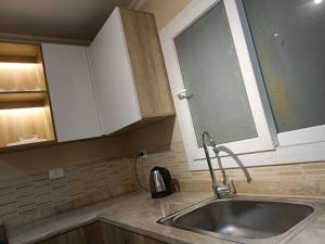 Sheraton ocean 603 - Private apartments tesisinde mutfak veya mini mutfak