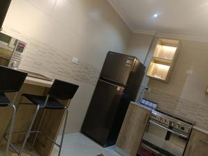 Sheraton ocean 603 - Private apartments tesisinde mutfak veya mini mutfak