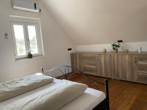 Postel nebo postele na pokoji v ubytování Ferienhaus Brunner