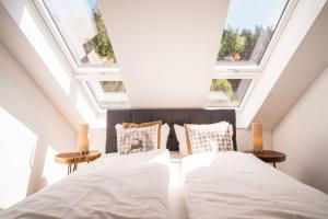 Postel nebo postele na pokoji v ubytování Hotel Großbach
