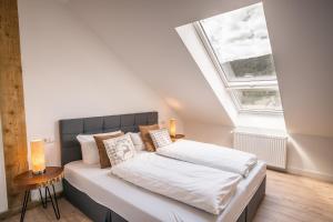 Postel nebo postele na pokoji v ubytování Hotel Großbach