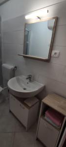 Koupelna v ubytování Apartmani Lorena